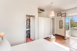 Postel nebo postele na pokoji v ubytování Casale Giancesare Villa Agricola