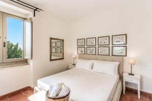 Postel nebo postele na pokoji v ubytování Casale Giancesare Villa Agricola