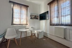 TV a/nebo společenská místnost v ubytování Hotel RON