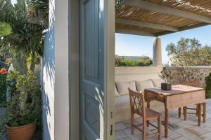 Balkón nebo terasa v ubytování Spitia Santorini Villa Collection
