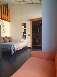 Postel nebo postele na pokoji v ubytování Loft immerso nel bosco