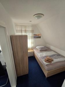 Postel nebo postele na pokoji v ubytování Monteurs-Ferienwohnung
