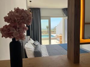 Postelja oz. postelje v sobi nastanitve Moonlight Hotel