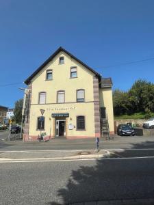 a building on the side of a road with a street at Hotel Ristorante Lucania bei Gerardo in Höhr-Grenzhausen