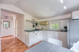 Кухня или мини-кухня в Cuvi Beach Apartments

