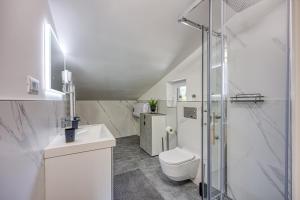 Ванная комната в Cuvi Beach Apartments