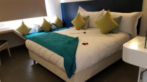 Postel nebo postele na pokoji v ubytování Relax Hôtel Oujda