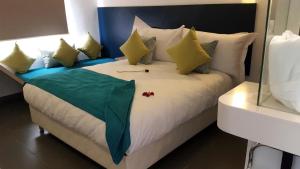 Postel nebo postele na pokoji v ubytování Relax Hôtel Oujda