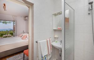 Ванная комната в Apartmani Galić 2 +37 фотографий