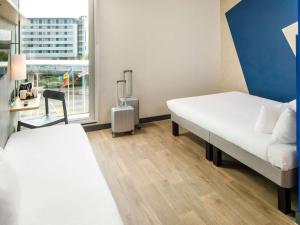 ibis budget Manchester Airport T2客房内的一张或多张床位