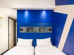 ibis budget Manchester Airport T2客房内的一张或多张床位
