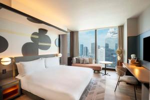 Canopy By Hilton Osaka Umeda客房内的一张或多张床位
