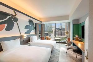 Canopy By Hilton Osaka Umeda客房内的一张或多张床位