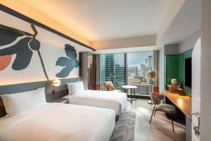 Canopy By Hilton Osaka Umeda客房内的一张或多张床位