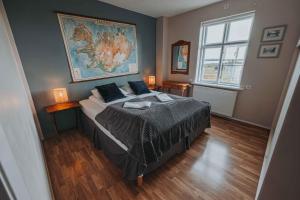 Postelja oz. postelje v sobi nastanitve Héradsskólinn Historic Guesthouse