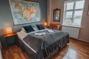Postelja oz. postelje v sobi nastanitve Héradsskólinn Historic Guesthouse
