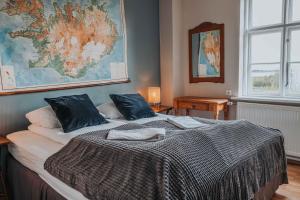 Postelja oz. postelje v sobi nastanitve Héradsskólinn Historic Guesthouse