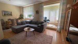 Posezení v ubytování Wohnung am Innovation Park + 7 fotografií