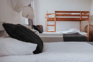 Postelja oz. postelje v sobi nastanitve Héradsskólinn Historic Guesthouse