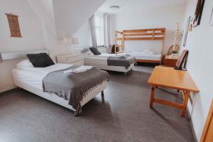 Postelja oz. postelje v sobi nastanitve Héradsskólinn Historic Guesthouse