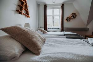 Postelja oz. postelje v sobi nastanitve Héradsskólinn Historic Guesthouse