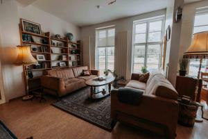 Predel za sedenje v nastanitvi Héradsskólinn Historic Guesthouse