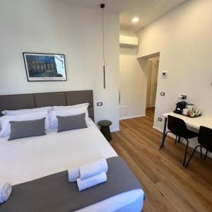 Postel nebo postele na pokoji v ubytování Sunrise Rooms
