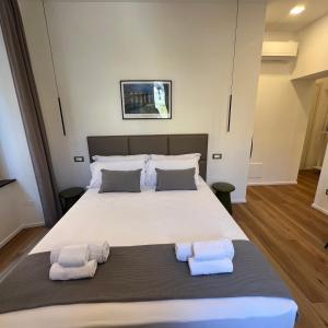 Postel nebo postele na pokoji v ubytování Sunrise Rooms