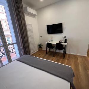 Postel nebo postele na pokoji v ubytování Sunrise Rooms