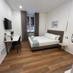 Postel nebo postele na pokoji v ubytování Sunrise Rooms