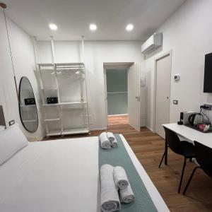 Postel nebo postele na pokoji v ubytování Sunrise Rooms