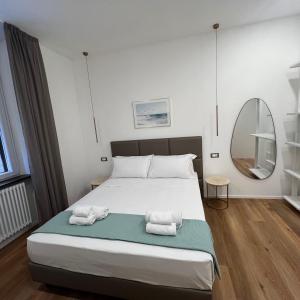 Postel nebo postele na pokoji v ubytování Sunrise Rooms