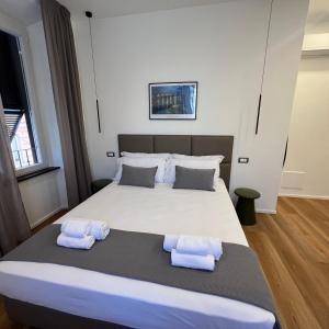 Postel nebo postele na pokoji v ubytování Sunrise Rooms
