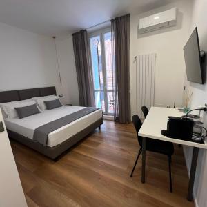 Postel nebo postele na pokoji v ubytování Sunrise Rooms