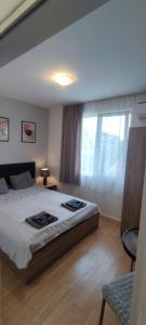 Postel nebo postele na pokoji v ubytování Benita Inn apartments