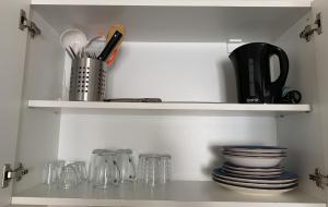 Kuchyňa alebo kuchynka v ubytovaní Silver Shine Apartman