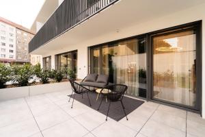 Balkón nebo terasa v ubytování Gold Garden Terrace Apartment