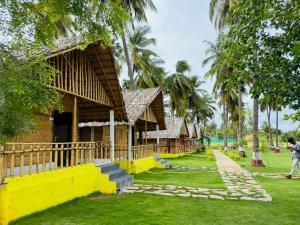 En hage utenfor Tamarind Tree Way Side Amenities