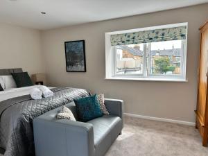 Giường trong phòng chung tại Russell Street- Studio Apartment