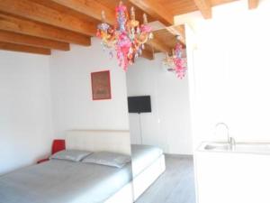 Postel nebo postele na pokoji v ubytování Direttamente Al Lago Apartments
