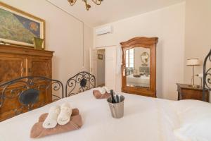 Katil atau katil-katil dalam bilik di Charmante vakantiewoning 'Casa Di Tonno'