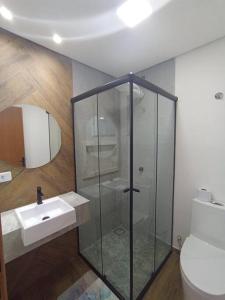Bilik mandi di Studio 22 vista para o mar