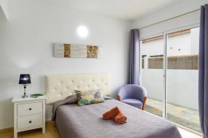 Posteľ alebo postele v izbe v ubytovaní Villa Esmeralda by Villa Plus