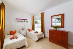 Posteľ alebo postele v izbe v ubytovaní Villa Esmeralda by Villa Plus + 21 fotografií
