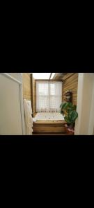Ένα ή περισσότερα κρεβάτια σε δωμάτιο στο Chalé CRISTAL Casa de temporada