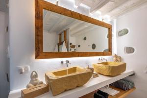 Ванна кімната в Onar Suites & Villas