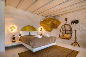 Postel nebo postele na pokoji v ubytování Onar Suites & Villas