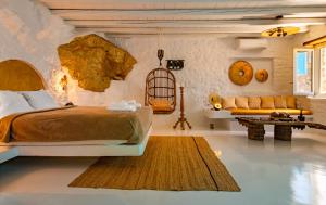 Ліжко або ліжка в номері Onar Suites & Villas
