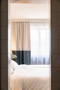 Ліжко або ліжка в номері City Hotel Biel Bienne Free Parking