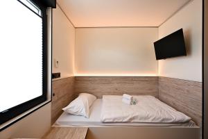 Postel nebo postele na pokoji v ubytování Roatel Busdorf A7 my-roatel-com